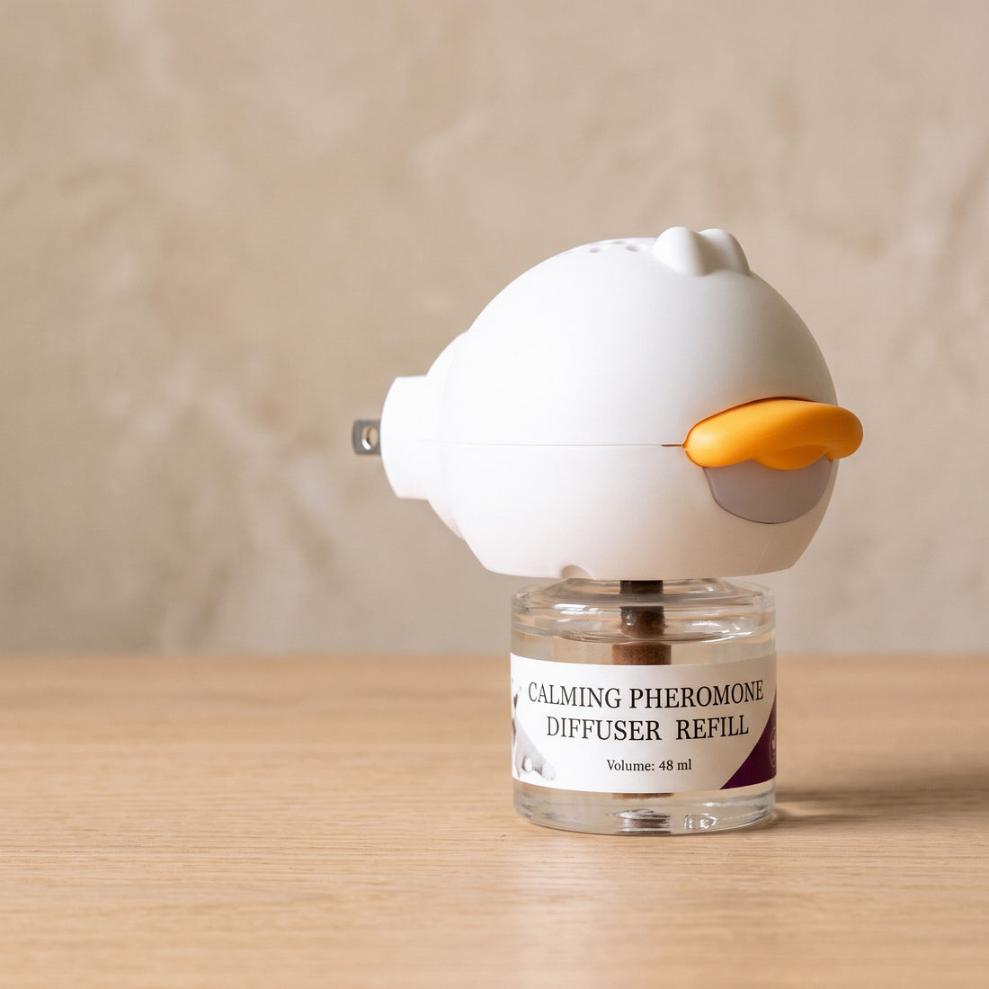 PurrEase cat calming diffuser with a 48 ml refill vial screwed in — your first Calm Plan box